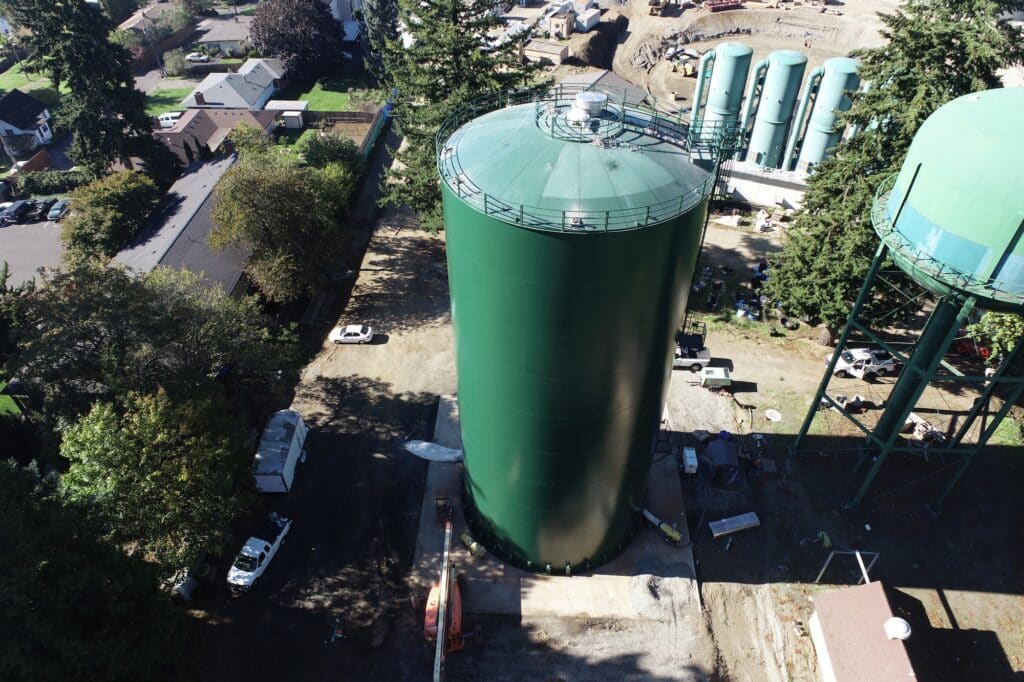 Large green water storage tank