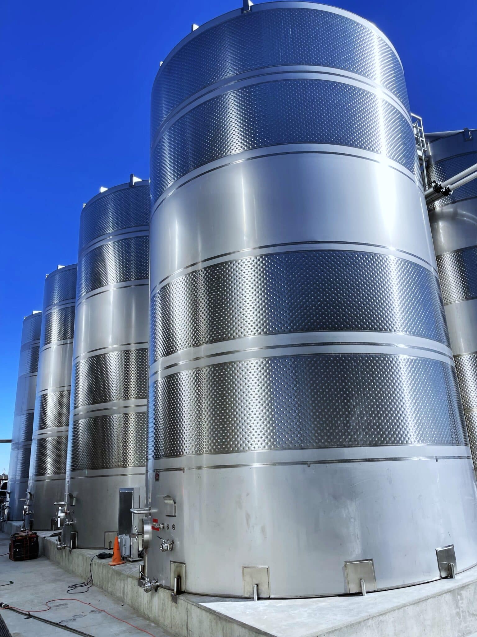 Stainless steel wine fermentation tanks at HOPE Winery